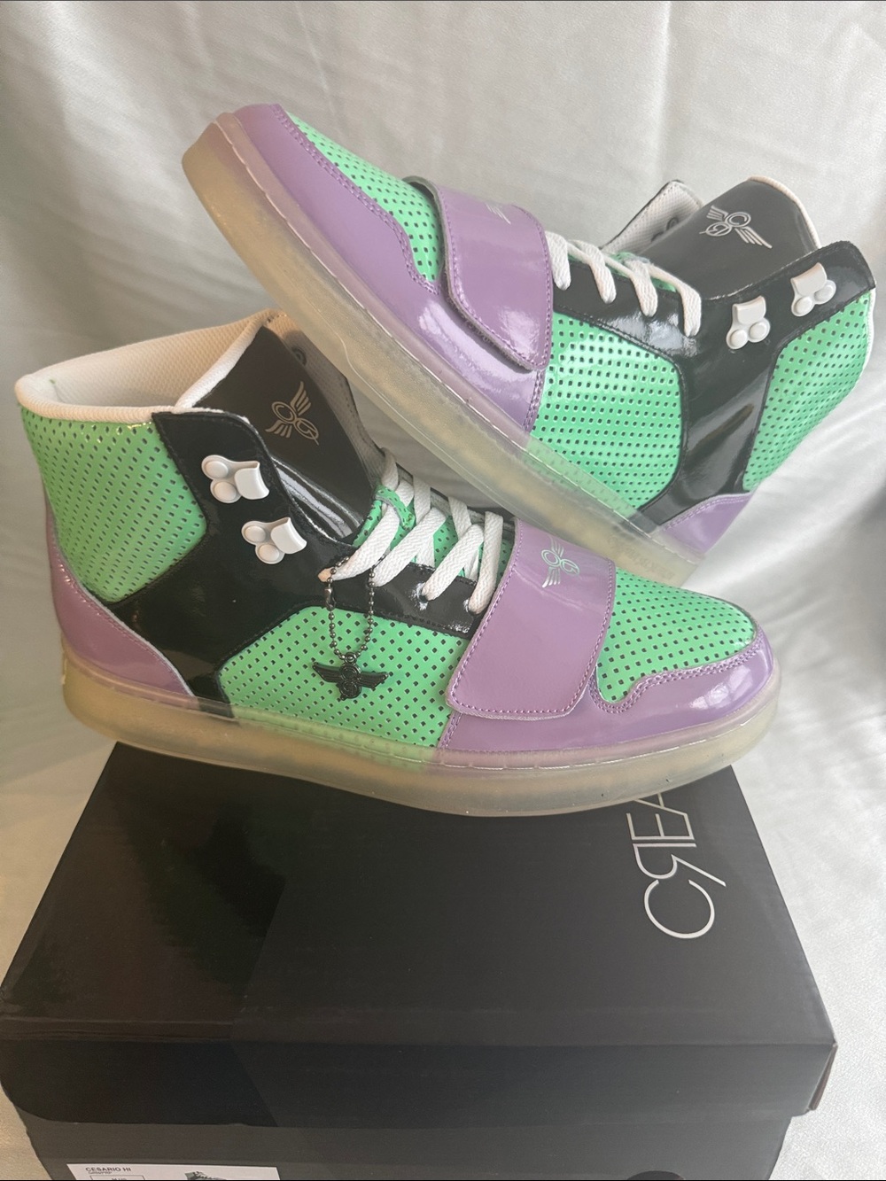 New! Creative Recreation Cesario Hi XXI sneakers in a vibrant green/purple.
